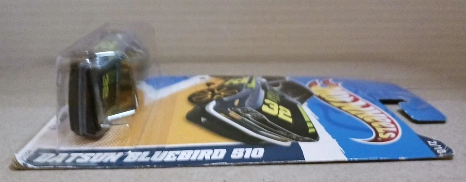 Modelo a escala 1:64 Hot Wheels Faster Than Ever 12 Datsun Bluebird 510 gris #32 Foto 4 de 4