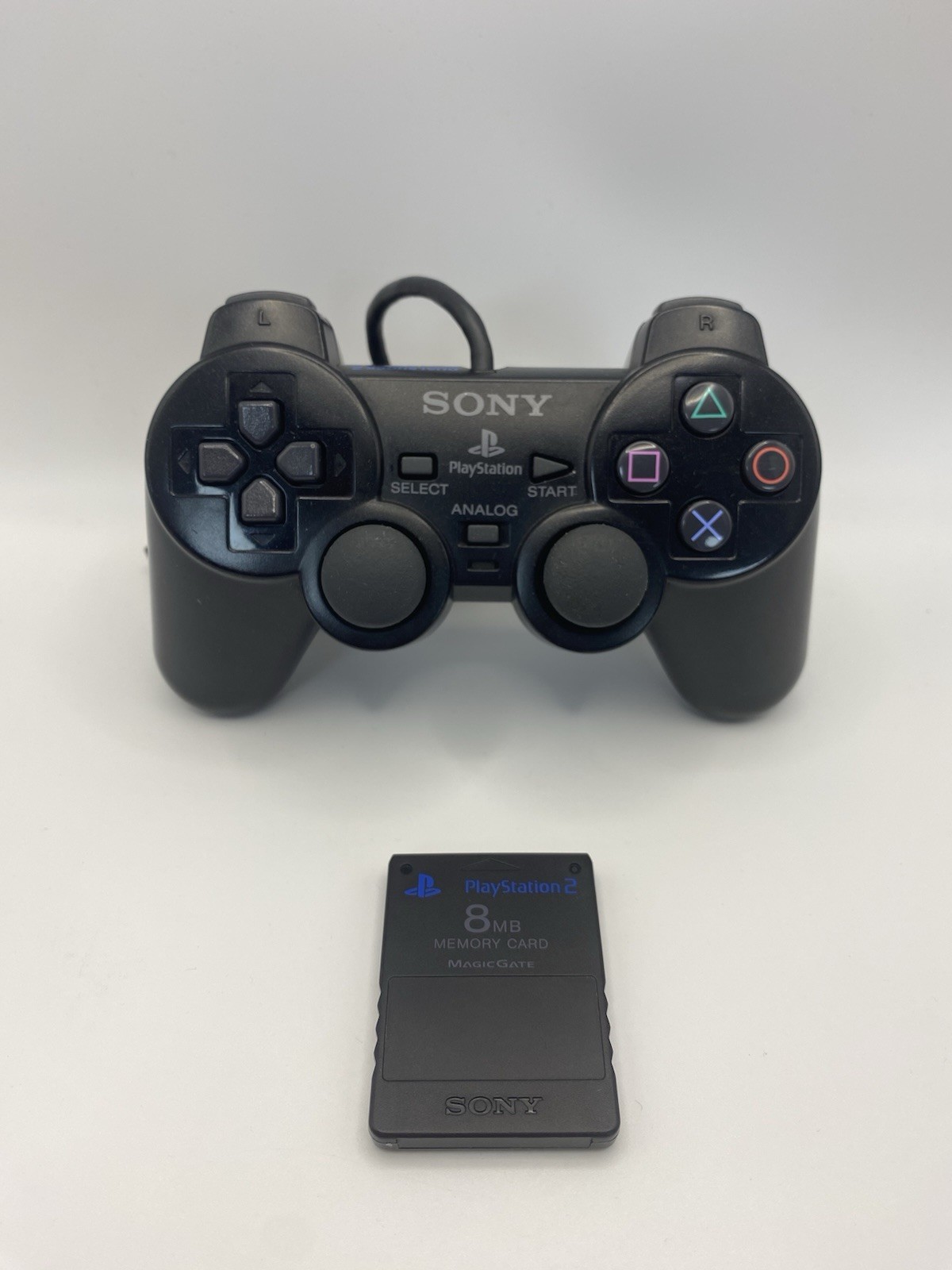 Sony Playstation DualShock Controller - Black Plus 8MB Memory Card