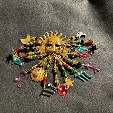 Vintage LUNCH AT THE RITZ Celestial Sun Zodiac Sign Dangle brooch pin Signed 80s