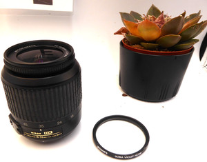 Nikon AF-S DX Nikkor 18-55mm f/3.5-5.6G ED I Lens + cap + filter also. tested