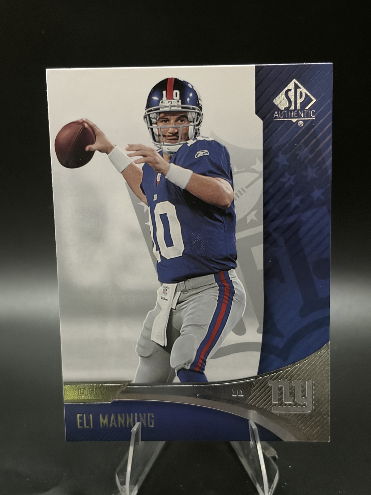 Eli Manning #57 Football Cards 2006 SP Authentic trading card — raw and PSA graded price guide