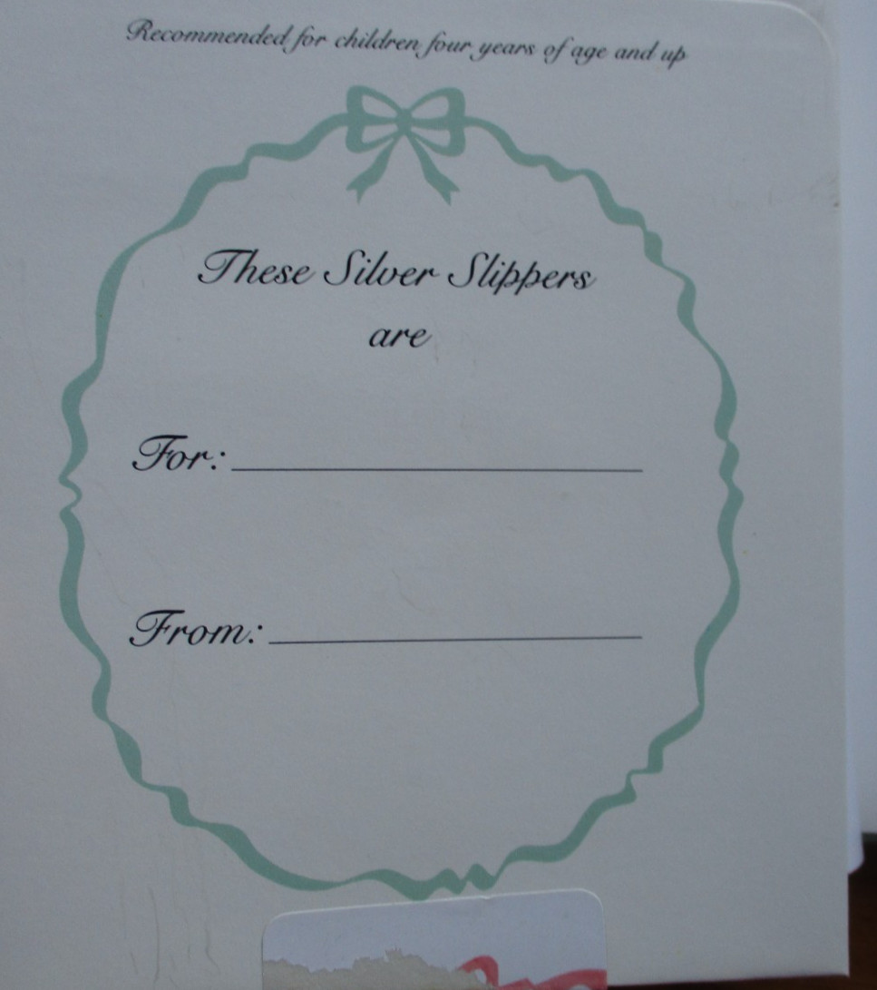 The Silver Slippers. Elizabeth Koda-Callan. Workman Publishing, 1989