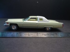 Auto World 1976 Cadillac Coupe DeVille Phoenecian Ivory - Loose 1:64