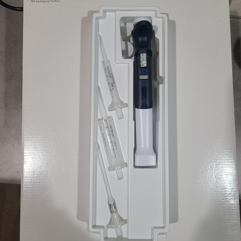 Gilson Distriman repeat pipettor with tips. Clean and accurate. eBay