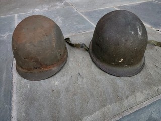 One lot of two M1 Rear Seam Helmets