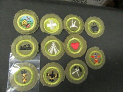 Lot of 11 Folded Under Khaki Crimped Edge Merit Badges     c22  