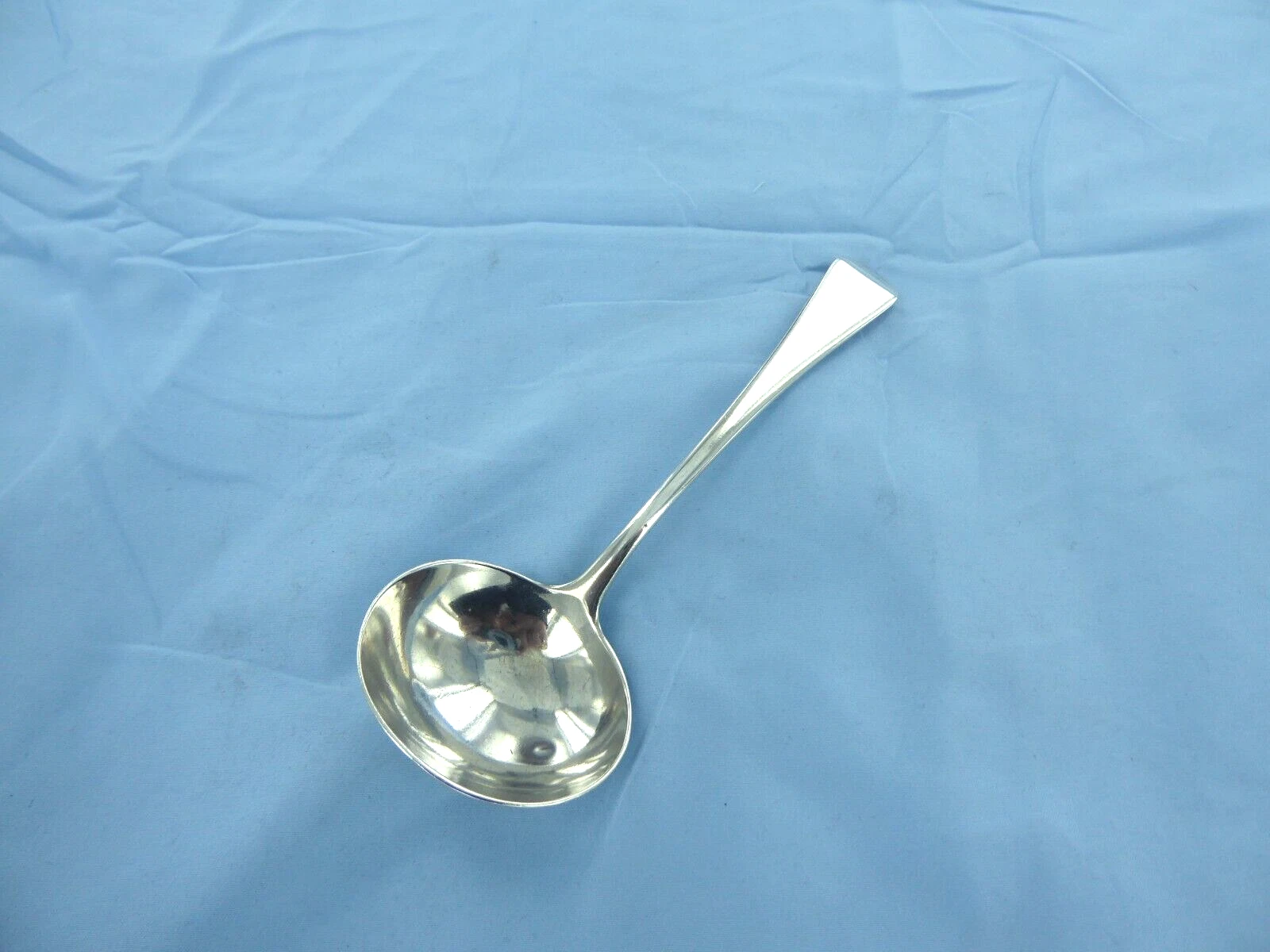 AN ANTIQUE STERLING SILVER, OLD ENGLISH SAUCE LADLE, LONDON 1817.
Opens in a new window or tab