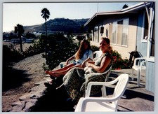 Vtg Color Snapshot Two Women Relaxing On Patio White Plastic Chairs View 1990s