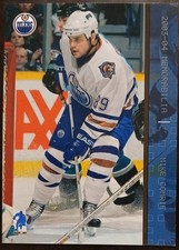 2003 - 2004 ITG Be A Player Mike Comrie Memorabilia Sapphire /100 #55