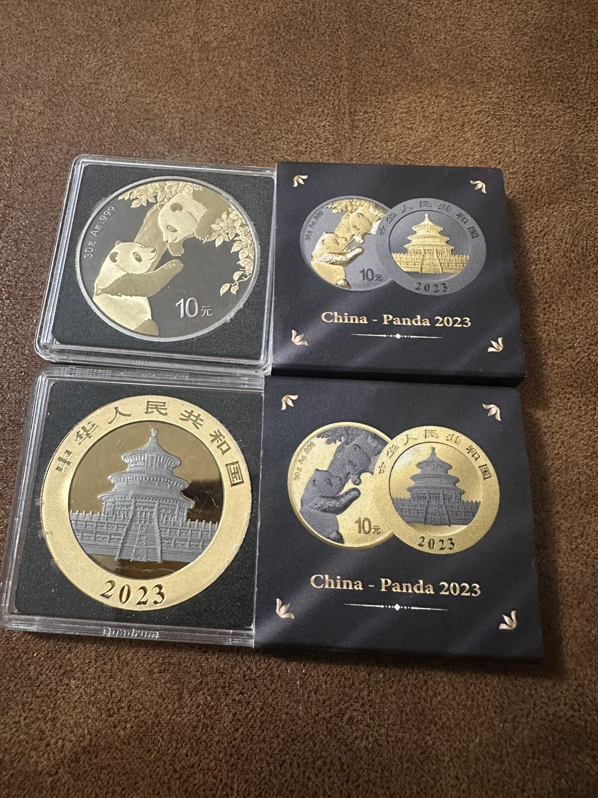 2023 Gold and Black Ruthenium China Silver Panda 10y Coin Set (2)