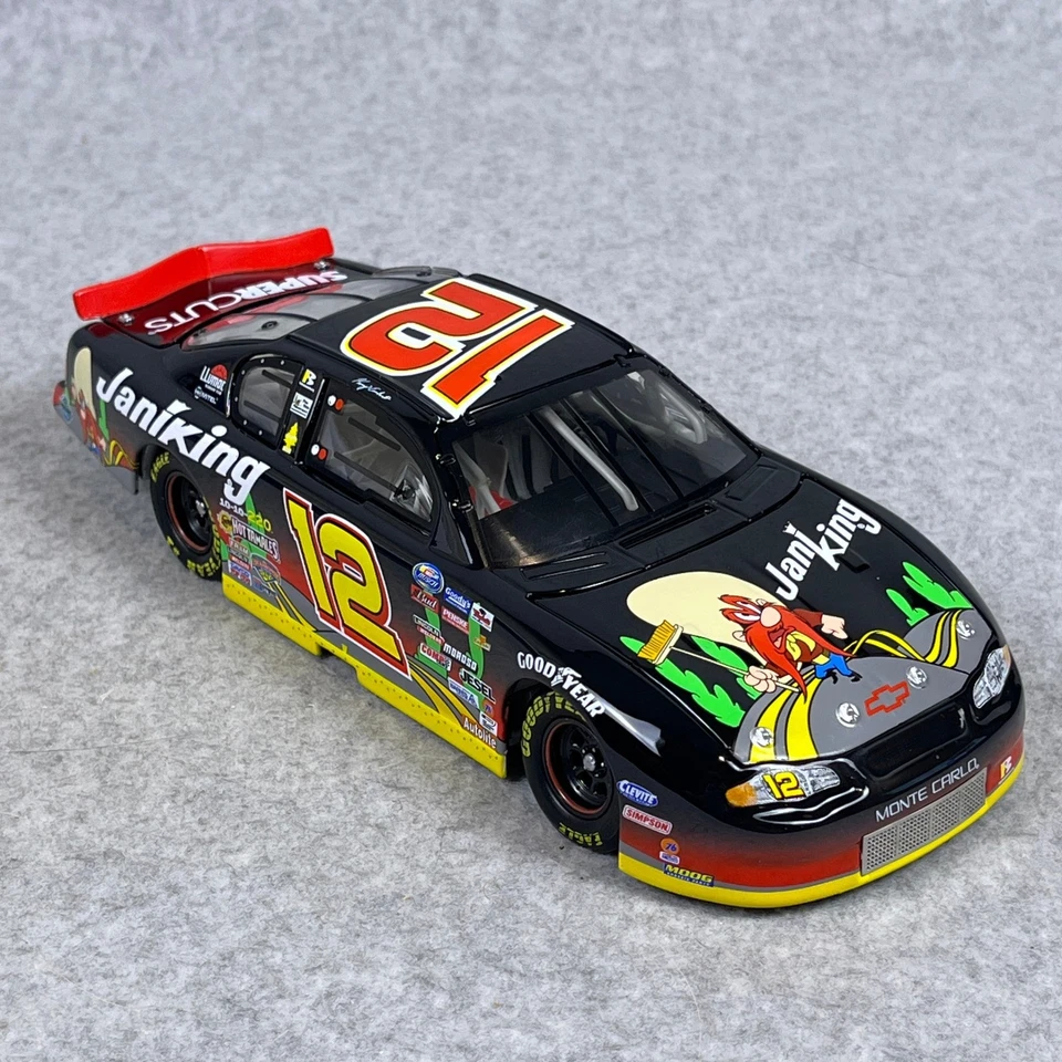Action 1:24 Kerry Earnhardt #12 JaniKing Looney Tunes 2002 Monte Carlo Diecast - Image 4 of 4