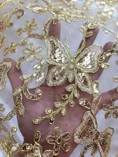 "Gold Lace Fabric with Embroidered Butterfly Design and Sequins - Sold by the Ya