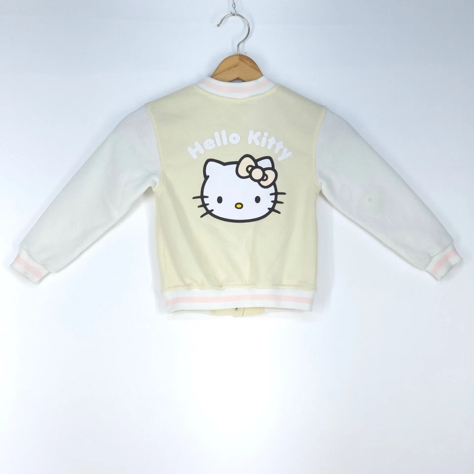 Chaqueta Universitaria Hello Kitty Niñas 6X Rosa Crema Lazo Sanrio 2024 Forrada de Vellón Foto 3 de 4