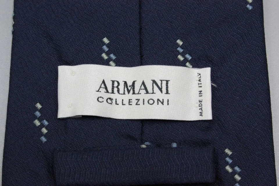 Corbata de lana de seda ARMANI COLLEZIONI. Azul con gris geométrico. Foto 2 de 3