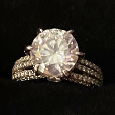 Make a Statement with a 12c Diamond and White Sapphires