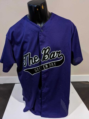 purple and green baseball jersey