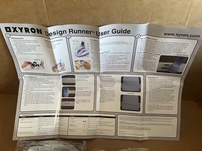 Xyron Handheld Printer Design Runner, Disc, Docking Station and instructions