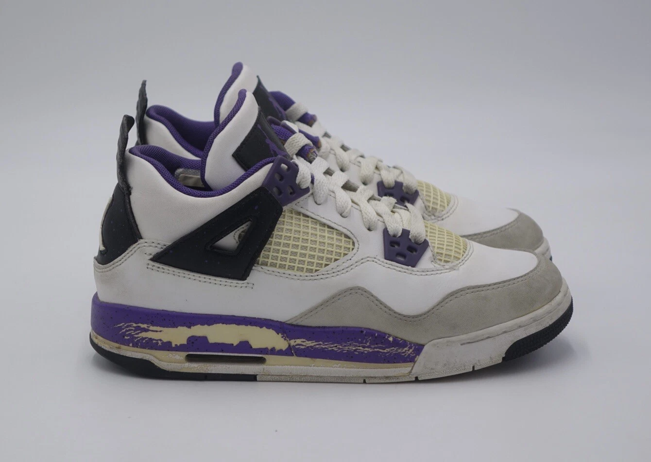Taglia 5Y Jordan 4 Retro Low Violet (GS)