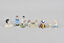 thumbnail 1 - k67a08- Konvolut kleine Porzellanfiguren und Teepuppen