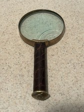 Vintage Magnifying glass brass and leather wrapped handle 7" crack in glass