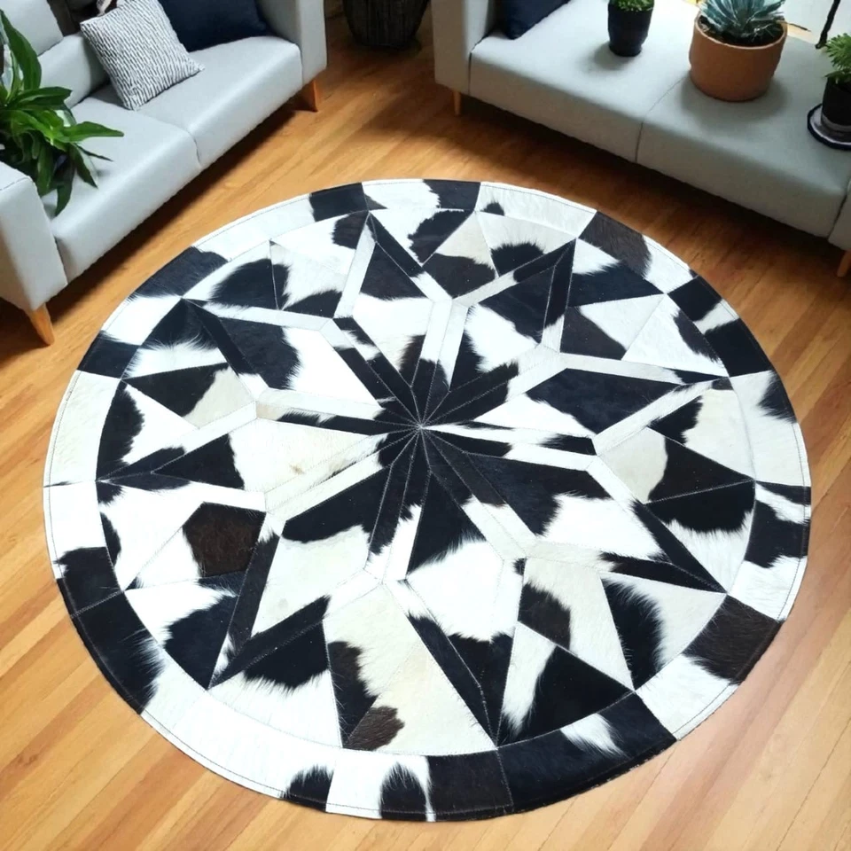 Alfombra redonda de retazos de cuero de vaca blanco y negro de lujo - alfombra moderna de pelo natural sobre piel Foto 2 de 4