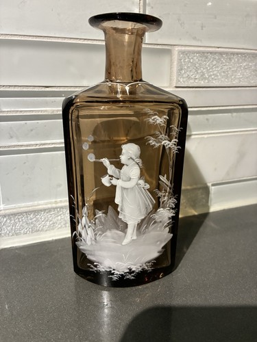 ANTIQUE AMBER MARY GREGORY STYLE GLASS DECANTER CHILD BLOWING BUBBLES 6” - Picture 1 of 11
