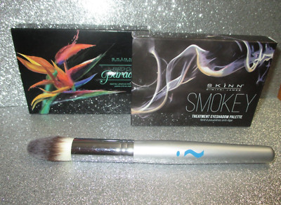 2 x SKINN Eye Shadow Palettes - BIRDS OF PARADISE/ SMOKEY & FREE Powder Brush