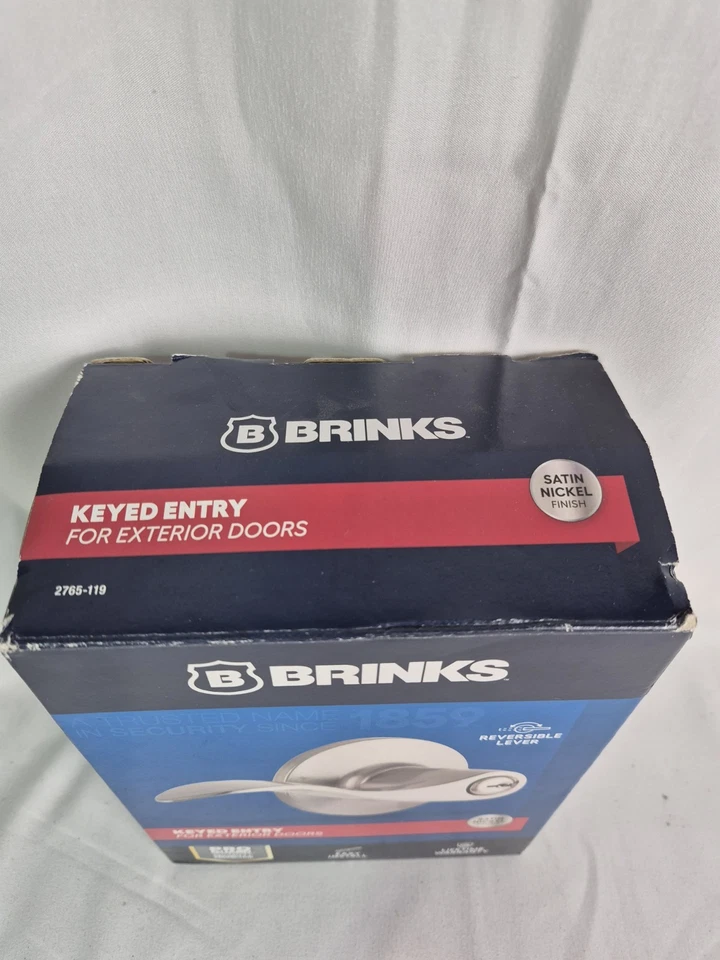 Pomo de puerta con palanca estilo ondulado moderno entrada con llave Brinks con níquel satinado Pro-Guard Foto 2 de 4