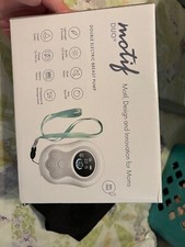 Brand new Breast pump, motif duo, comes with the storage bags and pump bra.