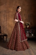 Raw Silk Fabric Maroon Color Lehenga Choli With Dupatta For Women Festival Wear
