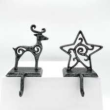 Two Christmas Stocking Hangers Reindeer And Star Black And Silver Metal