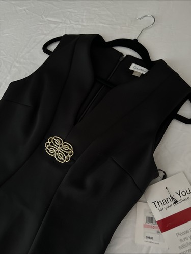 Calvin Klein Black Sleeveless Sheath Dress w/ gold medallion Size 10 NEW - Picture 2 of 6