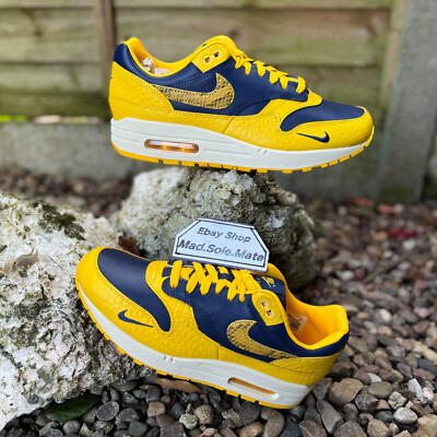 navy blue and yellow air max 97