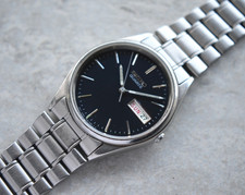 October 1993 Seiko Men's Watch Quartz Day Date Blue Dial Steel Bracelet