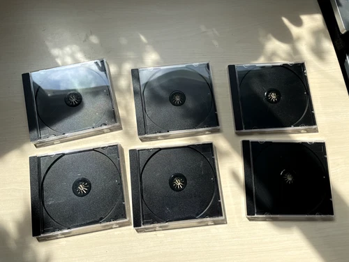 6 UNUSED, Jewel cases for DVDs or CDs. Black backed. Good condition.