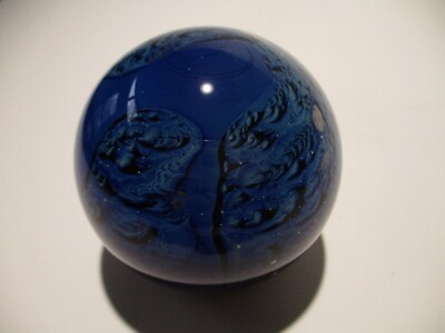 Josh Simpson inhabited planet glass paperweight