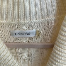 Calvin Klein size small cream colored sweater dress. Cable sweater.