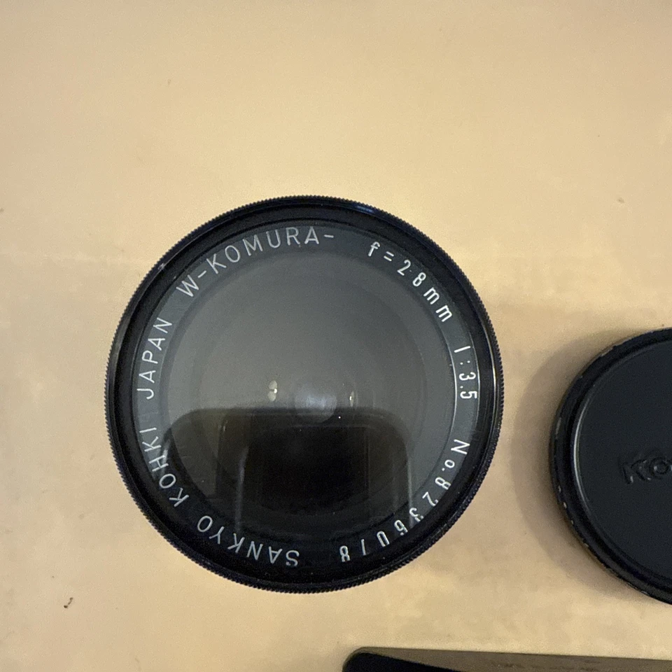 Lente Sankyo Kohki W-Komura 28 mm 1:3,5 Uni montaje de tornillo automático Foto 3 de 4