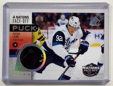 2025-26 SP Game Used 4 Nations Face-Off Puck Patrik Laine Finland / Montreal