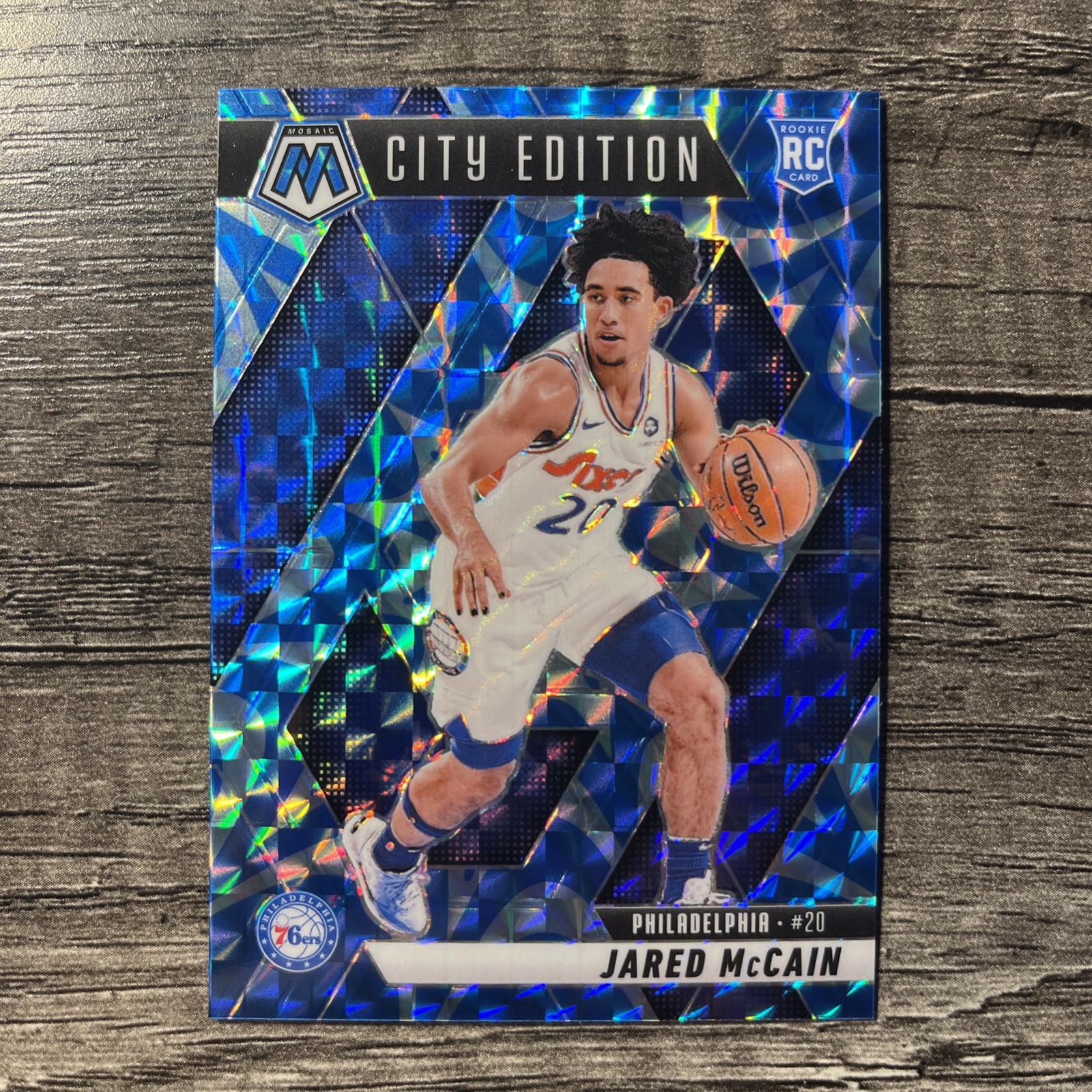 2024-25 Mosaic 💥Jared McCain💥ROOKIE RC Reactive Blue City Edition #277 76ers