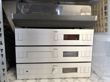 Revox-Anlage silber: CD-Player B22, Amplifier B25 und Tuner B26