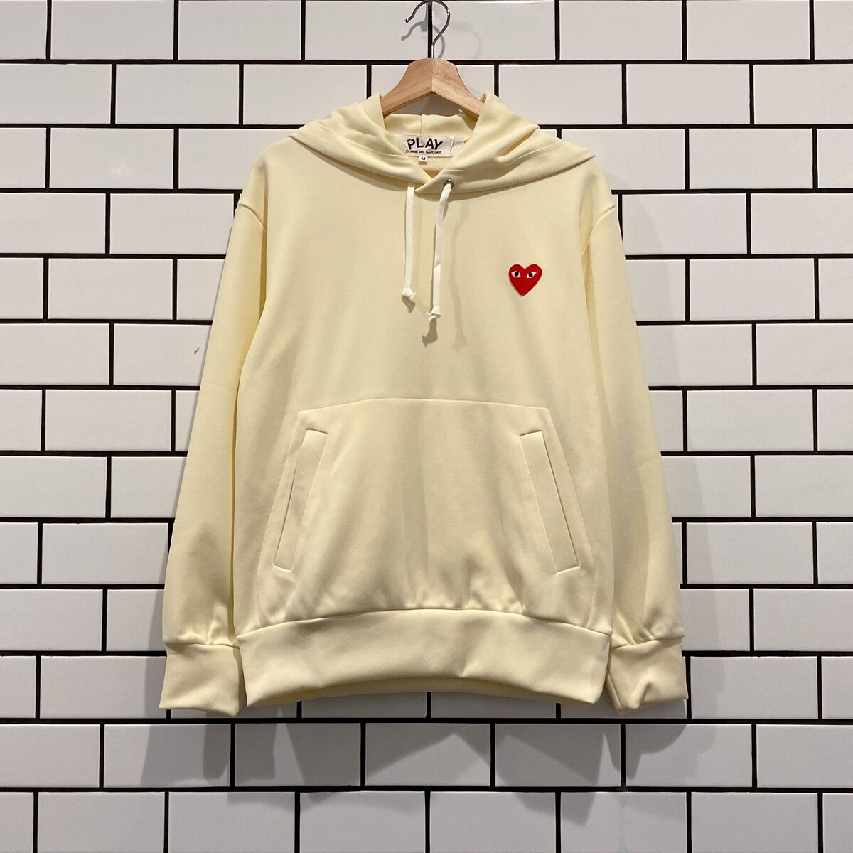 COMME DES GARCONS CDG PLAY RED HEART PULLOVER HOODIE IVORY COMME DES GARCONS CDG PLAY RED HEART PULLOVER HOODIE IVORY