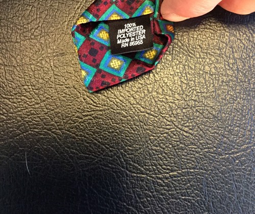 Cravatta vintage Henry & Co. blu nera rossa gialla a quadri geometrica USA anni 90 - Foto 6 di 7