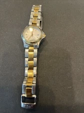 ESQ Swiss two tone, preowned chip On front face Of Glass