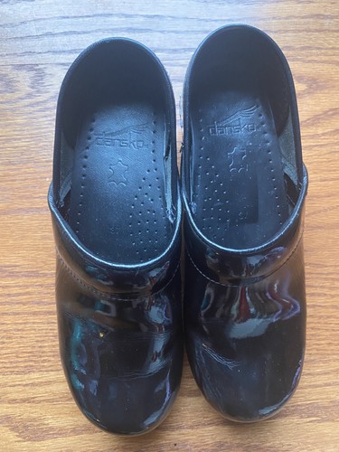shiny black nursing clogs