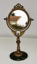 Superbe miroir de coiffeuse pivotant soutenu par l’aigle impérial