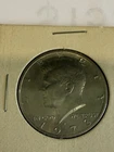 1973 D Kennedy Half Dollar AU