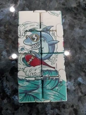 In finity cube fidget toy with Shark On A Skateboard Surfing A Wave - Metal