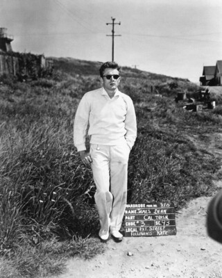 James Dean looking cool in sunglasses posing on set East of Eden