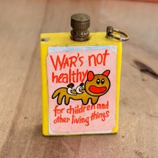 Vtg Japan Permanent Match Yellow Key Chain 1950's w Anti War Sticker, 1.5"